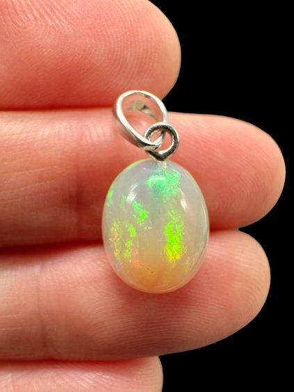 Silver faceted precious opal pendant