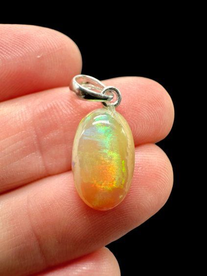 Silver faceted precious opal pendant
