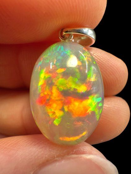Silver faceted precious opal pendant