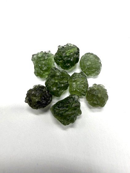 A bead made of raw moldavite – random piece