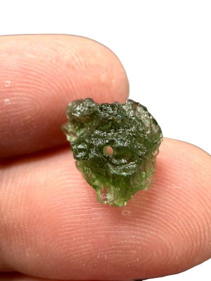 A bead made of raw moldavite 0,78g