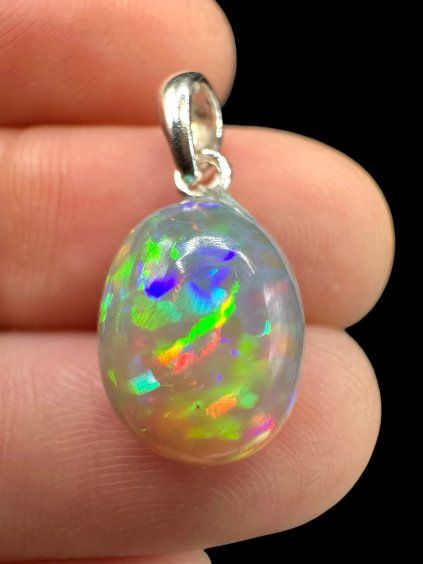 Silver faceted precious opal pendant