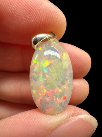 Silver faceted precious opal pendant