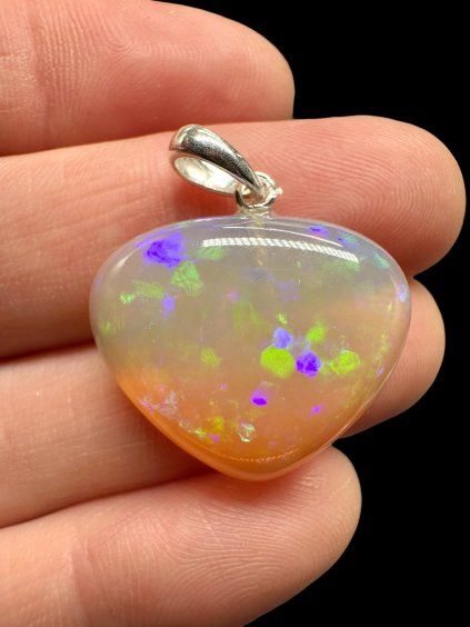 Silver faceted precious opal pendant