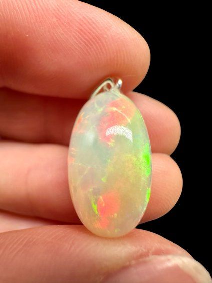 Silver faceted precious opal pendant