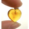 Silver amber pendant