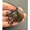 Pendant with ammonite