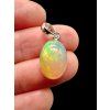 Silver faceted precious opal pendant