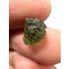 A bead made of raw moldavite 0,54g