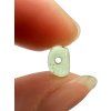 Moldavite bead with a drilled hole