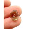 Moldavite bead with a drilled hole