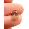 Moldavite bead with a drilled hole