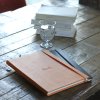 Webntbook ORANGE A4 96 sheets lined ivory 90g, paper elastic closure