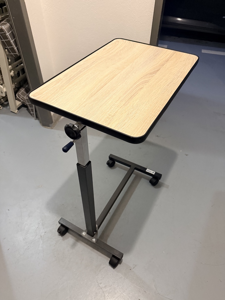 Lůžkový stolek UNIZDRAV — hydraulický a výškově nastavitelný