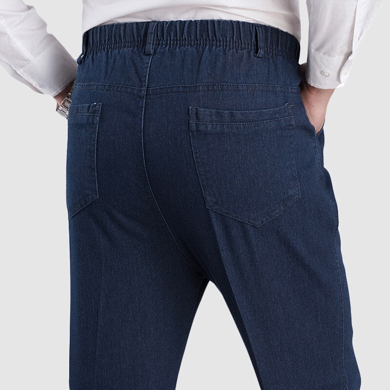 Levně CARANFLER Pánské elastické kalhoty denim baggy s gumou v pase Barva: Modrá