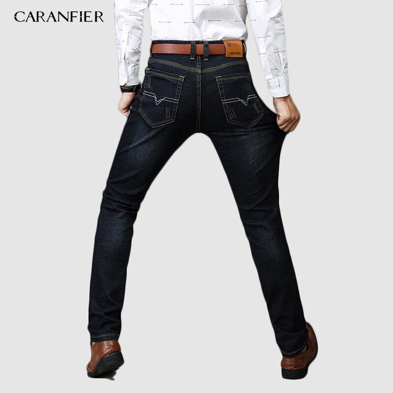 Levně CARANFLER Elastické pánské džíny slim skinny s prošíváním Barva: Černá