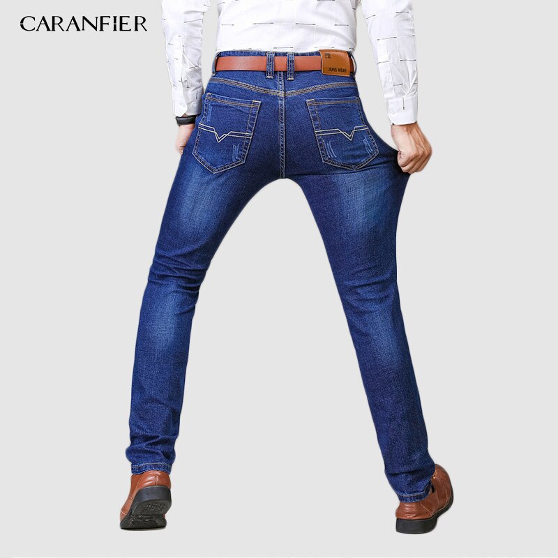 Levně CARANFLER Elastické pánské džíny slim skinny s prošíváním Barva: Modrá