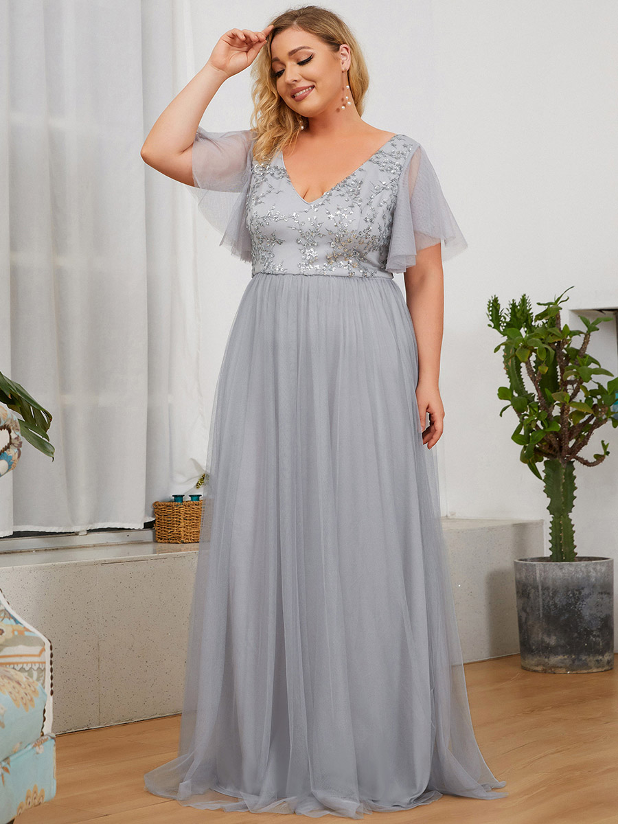 Společenské šaty s tylovými rukávy - šedé PLUS SIZE Barva: Šedá, Velikost: 6XL