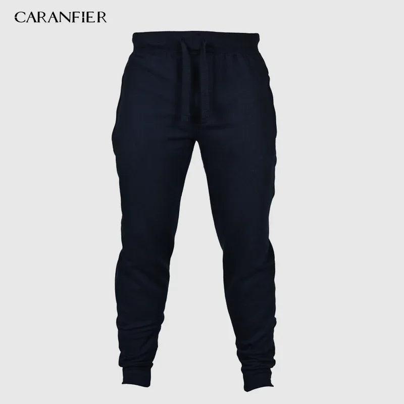 CARANFLER Tepláky typu jogger s elastickým pasem Barva: Modrá, Velikost: S