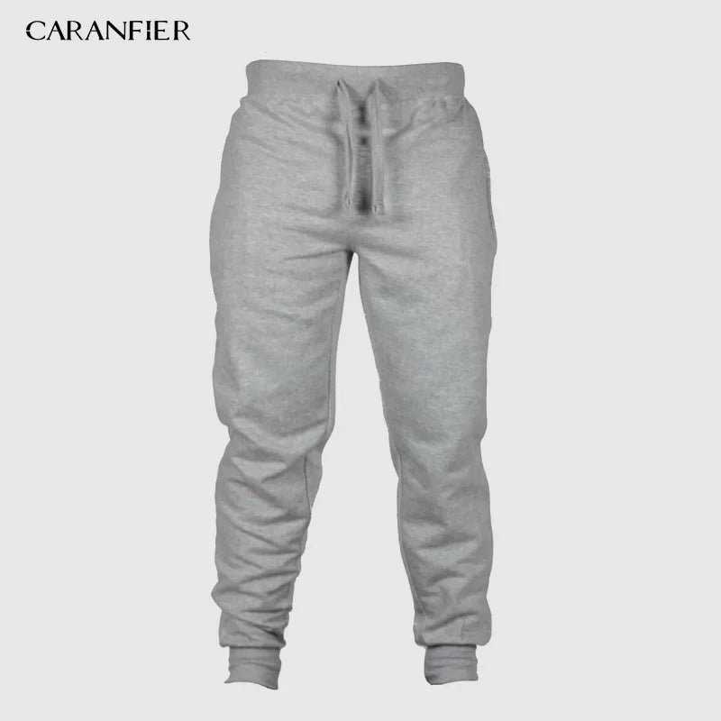 CARANFLER Tepláky typu jogger s elastickým pasem Barva: Šedá, Velikost: XL