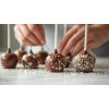 vygeneruj mi fotku, kde je videt, jak se vyrabi cake pops s vanoci tematikou, at jsou cake pops macene jen v hnede cokolade a muze byt jako ozdoba na nekterych hvezdicka nebo snehova vlocka