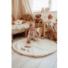 playandgo organic soft babymat moon child sitting on mat other child also in kidsroom