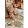 PlayandGo EEVAA treehouse puzzlemat child is making a puzzle of the mat
