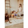 PlayandGo EEVAA farm puzzlemat child is playing with wooden blocks and other child with wooden swing board