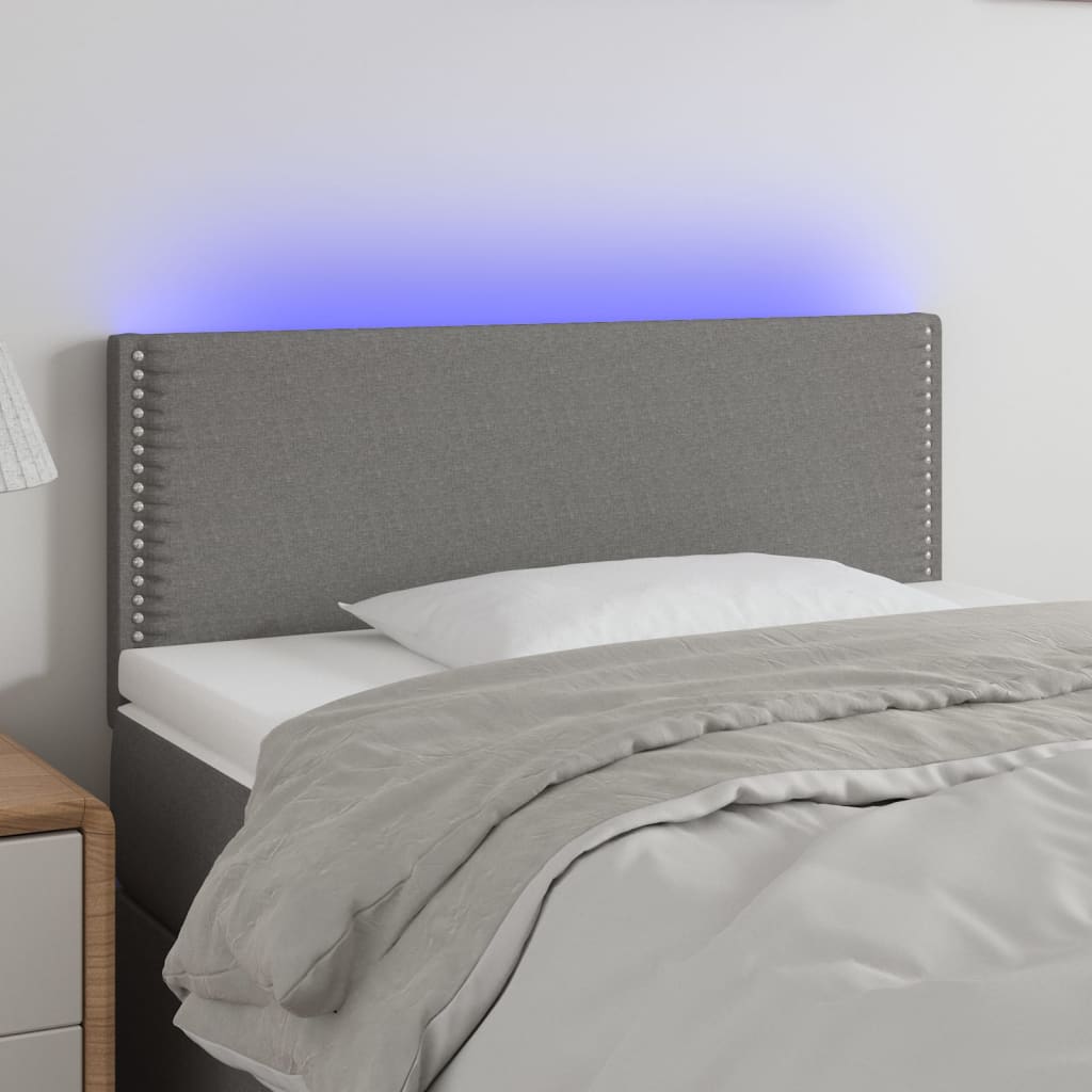 Čelo postele s LED tmavě šedé 90x5x78/88 cm textil