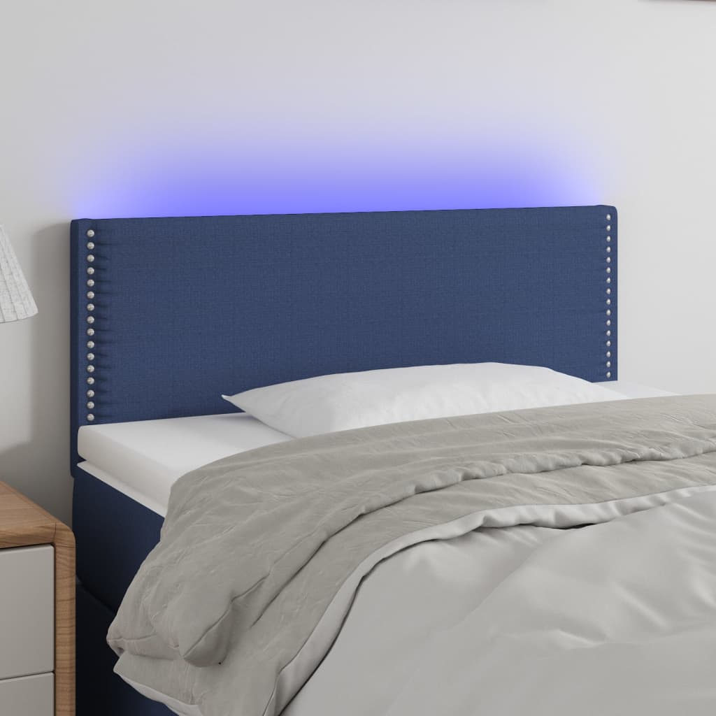 Čelo postele s LED modré 100x5x78/88 cm textil
