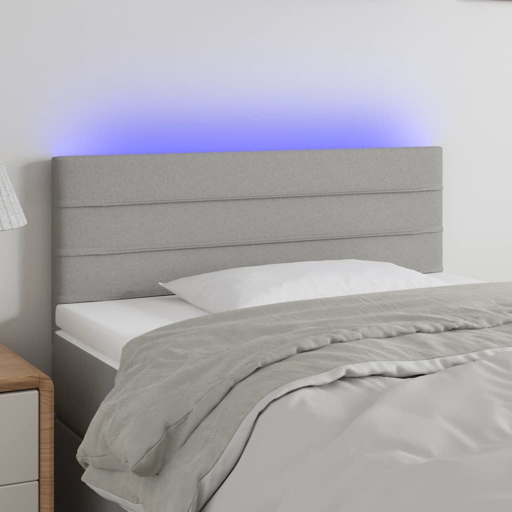 Čelo postele s LED světle šedé 80 x 5 x 78/88 cm textil