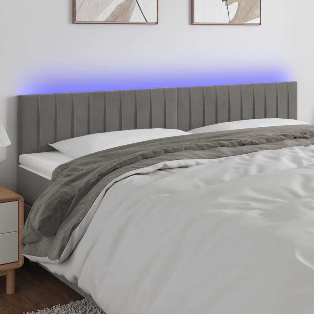 Čelo postele s LED světle šedé 200x5x78/88 cm samet