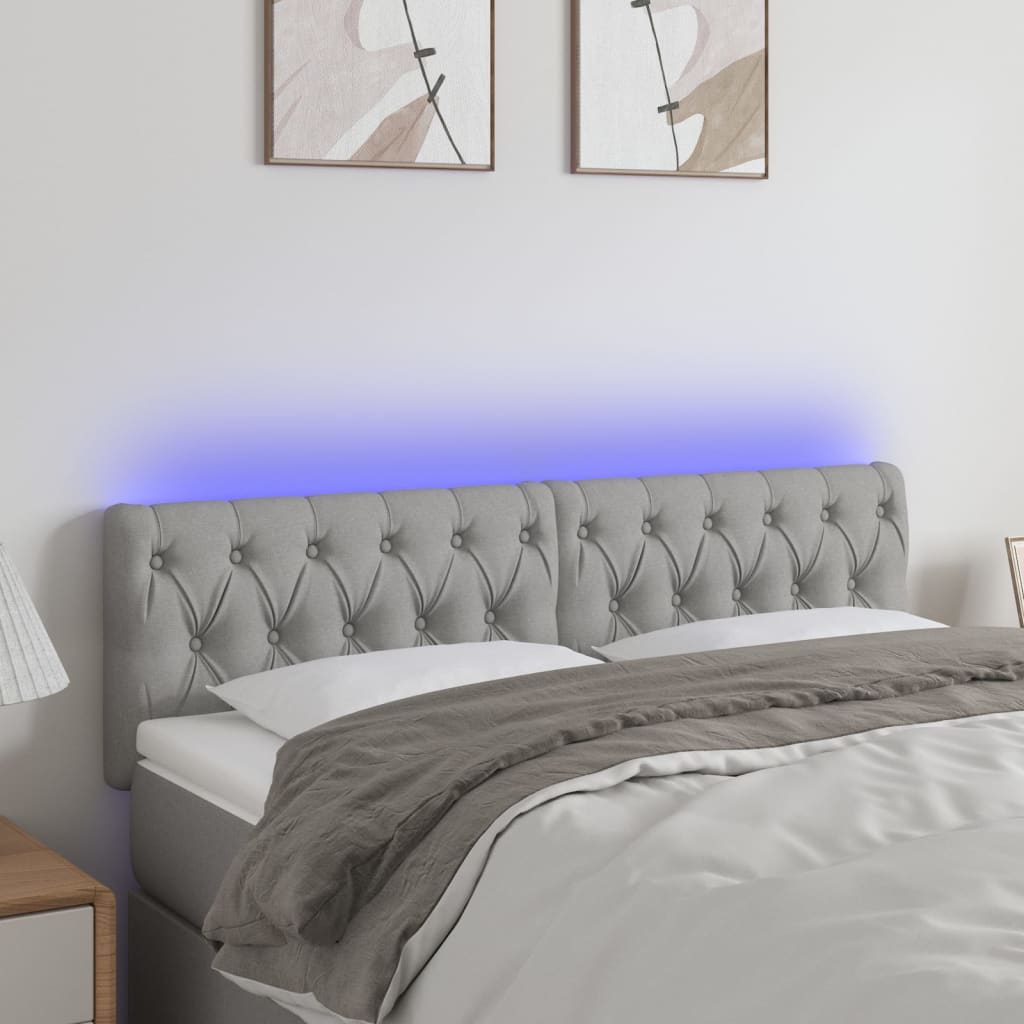 Čelo postele s LED světle šedé 160 x 7 x 78/88 cm textil