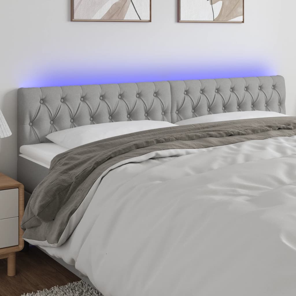 Čelo postele s LED světle šedé 180x7x78/88 cm textil