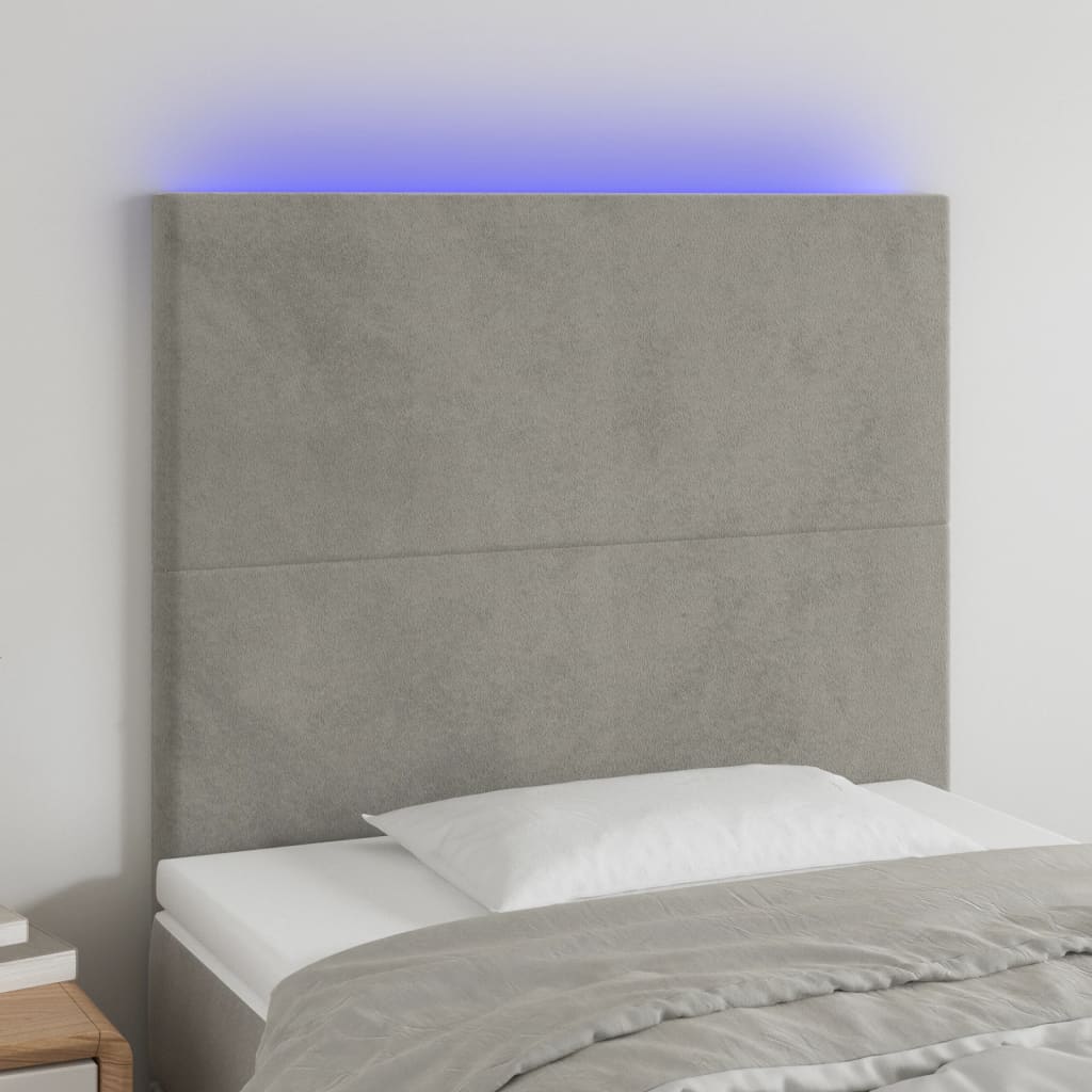 Čelo postele s LED světle šedé 100x5x118/128 cm samet