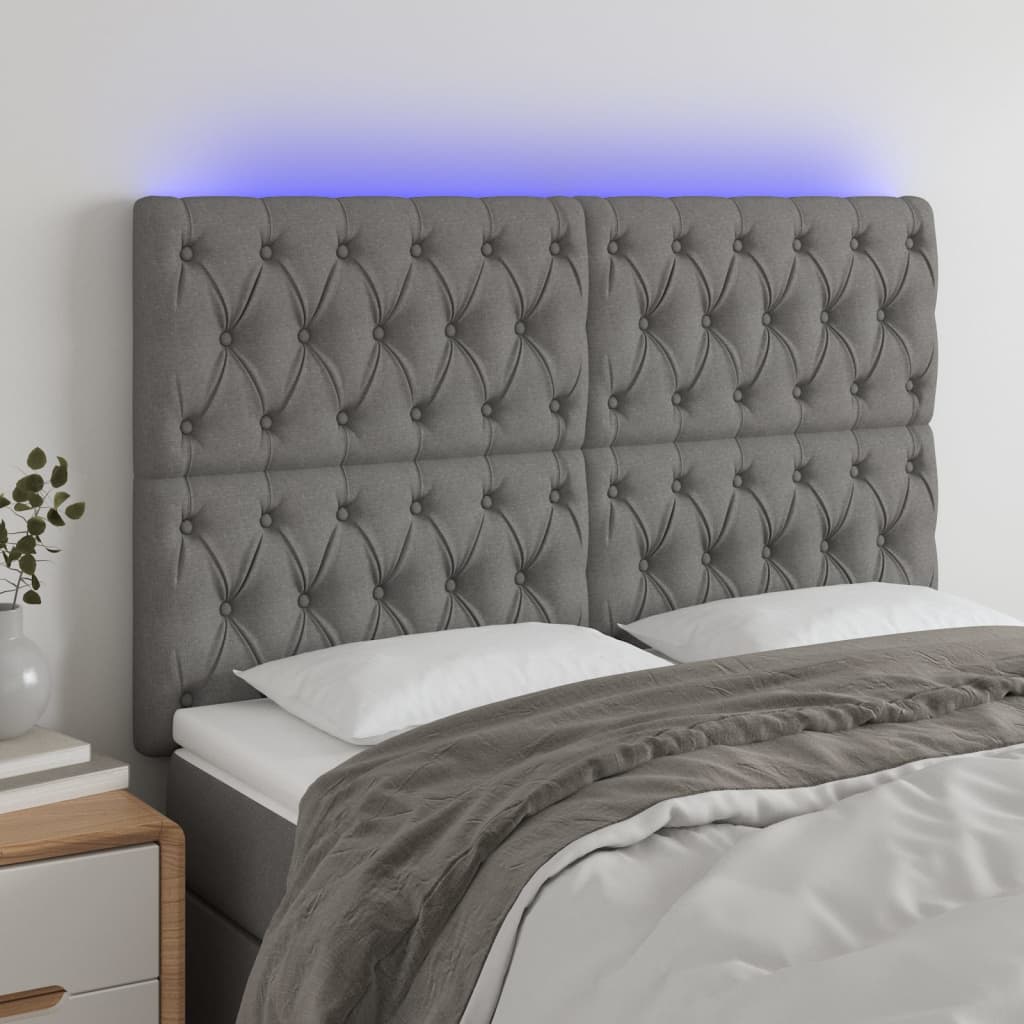 Čelo postele s LED tmavě šedé 160x7x118/128 cm textil