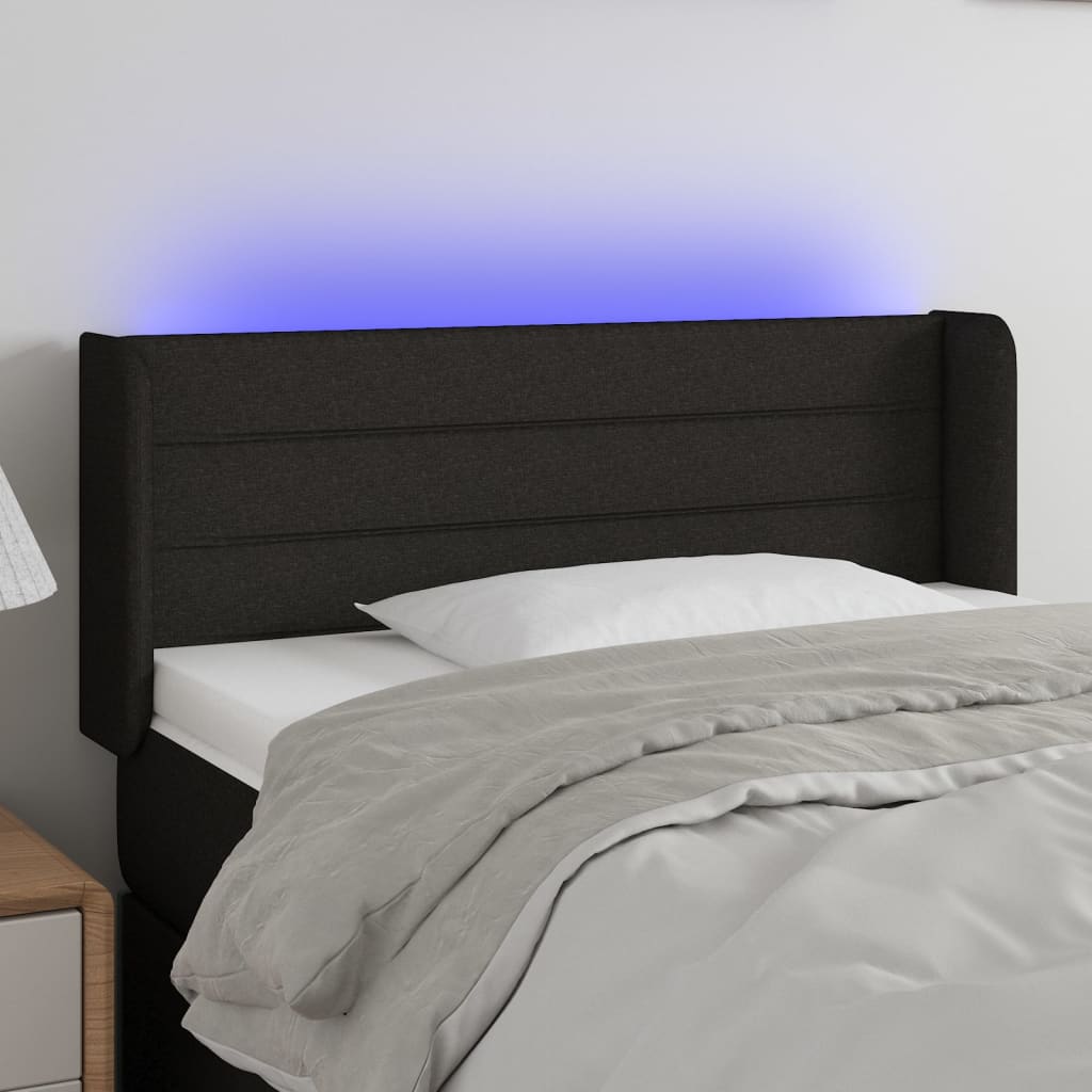 Čelo postele s LED černé 83 x 16 x 78/88 cm textil