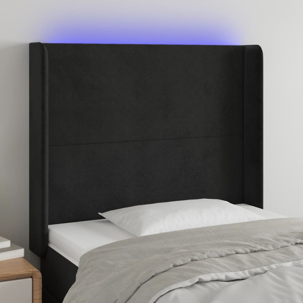 Čelo postele s LED černé 103 x 16 x 118/128 cm samet