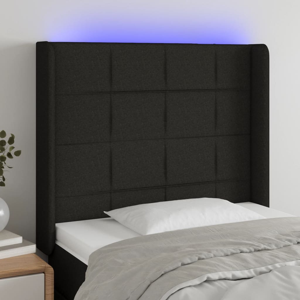 Čelo postele s LED černé 103 x 16 x 118/128 cm textil