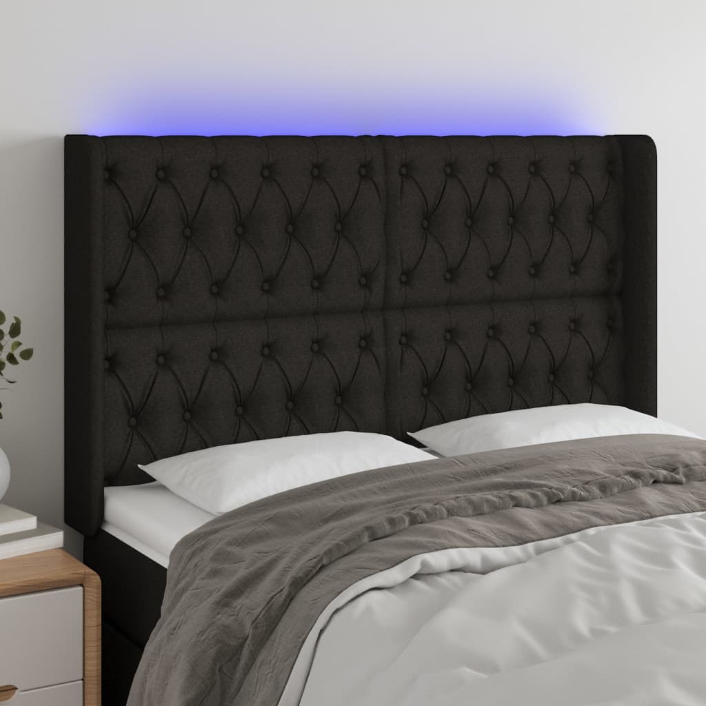 Čelo postele s LED černé 163 x 16 x 118/128 cm textil