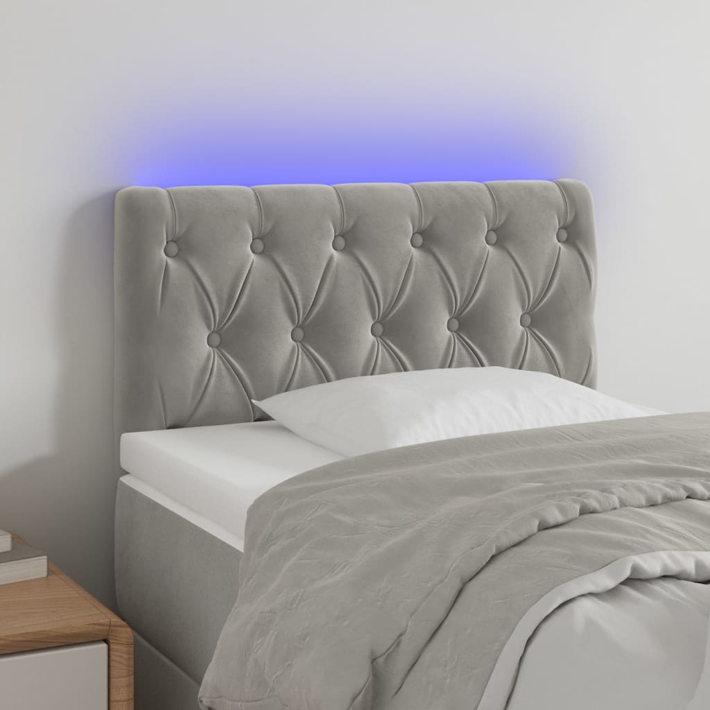 Čelo postele s LED světle šedé 80 x 7 x 78/88 cm samet