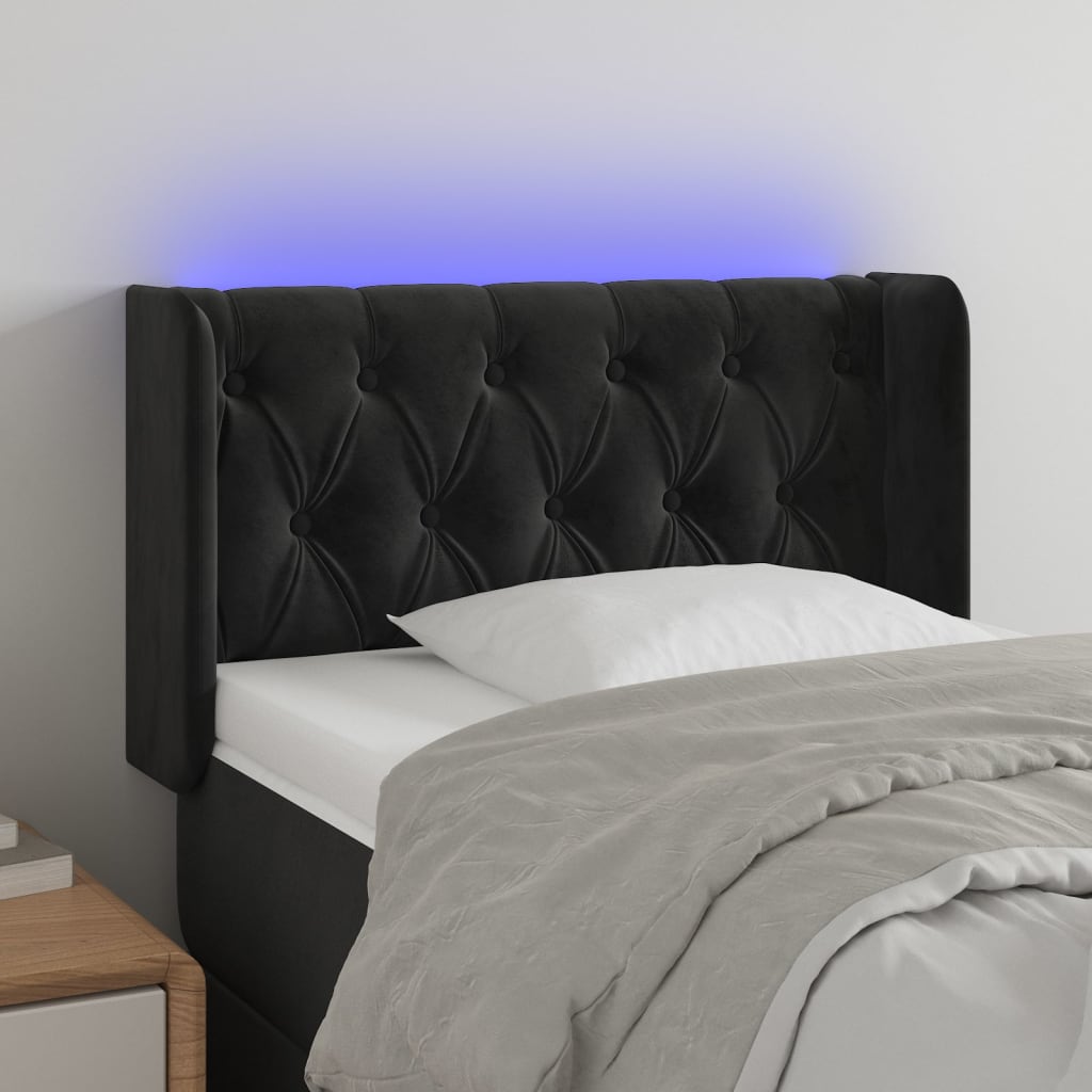 Čelo postele s LED černé 83 x 16 x 78/88 cm samet