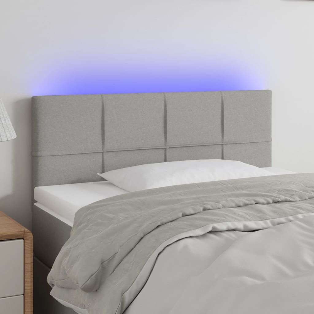 Čelo postele s LED světle šedé 90x5x78/88 cm textil