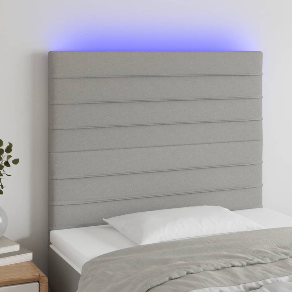 Čelo postele s LED světle šedé 100x5x118/128 cm textil