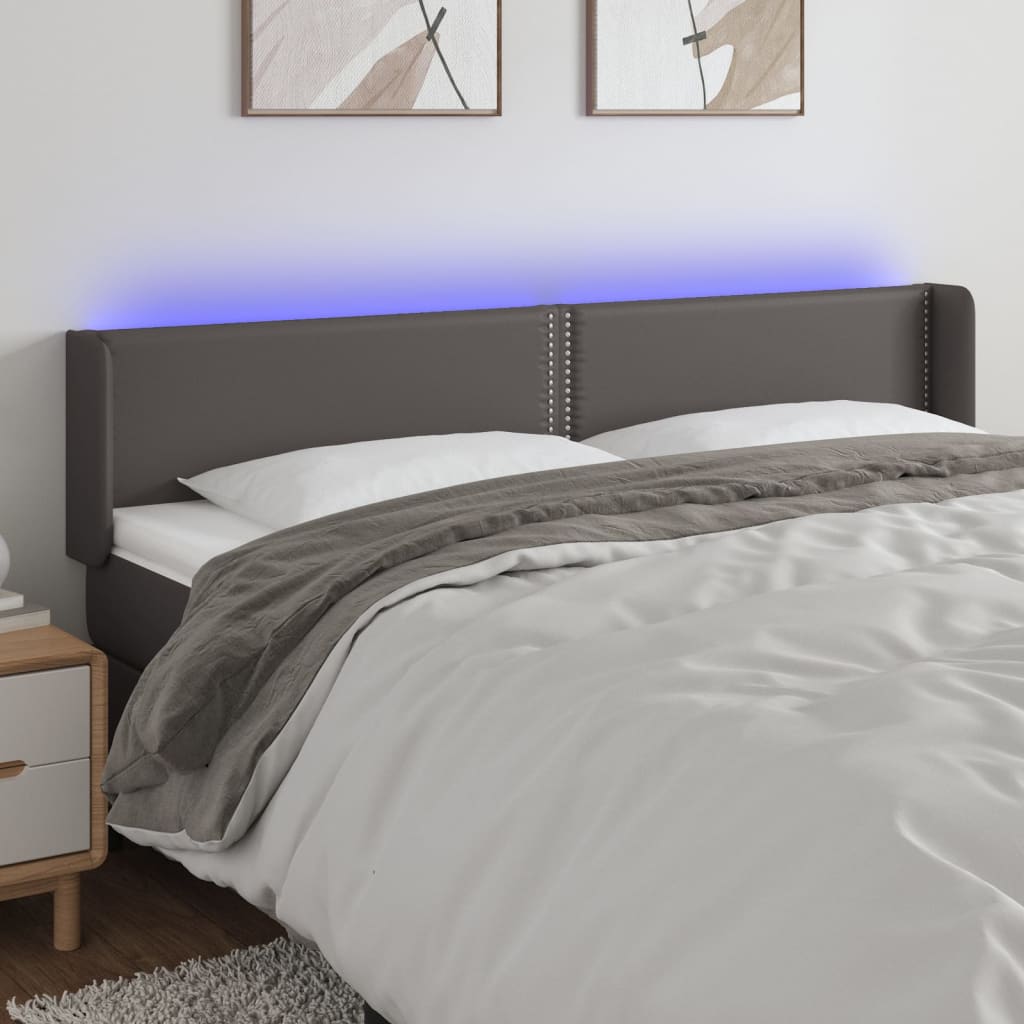 Čelo postele s LED šedé 163 x 16 x 78/88 cm umělá kůže