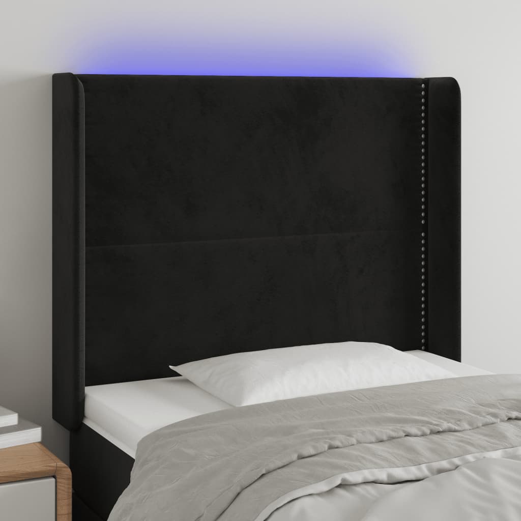 Čelo postele s LED černé 103 x 16 x 118/128 cm samet