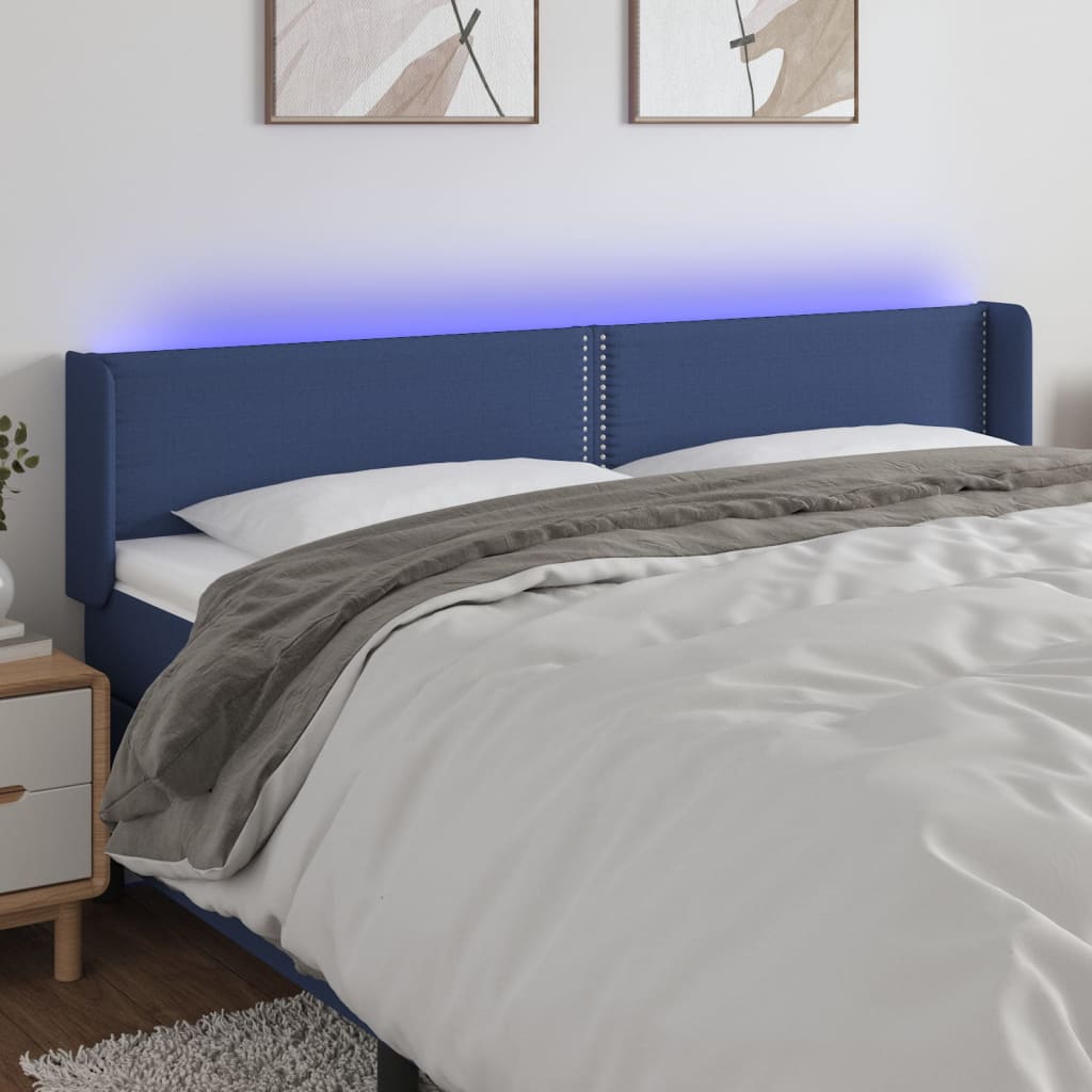 Čelo postele s LED modré 163 x 16 x 78/88 cm textil