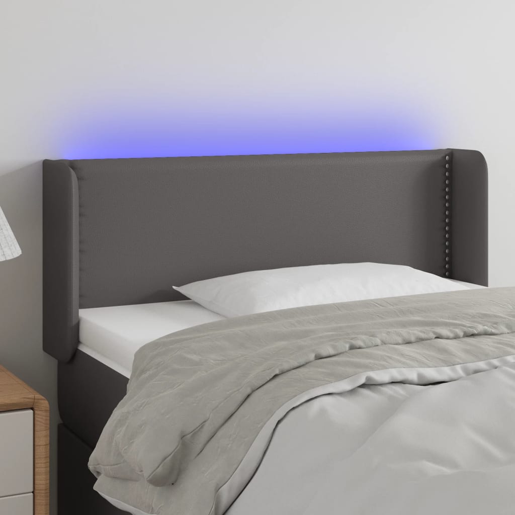 Čelo postele s LED šedé 83 x 16 x 78/88 cm umělá kůže