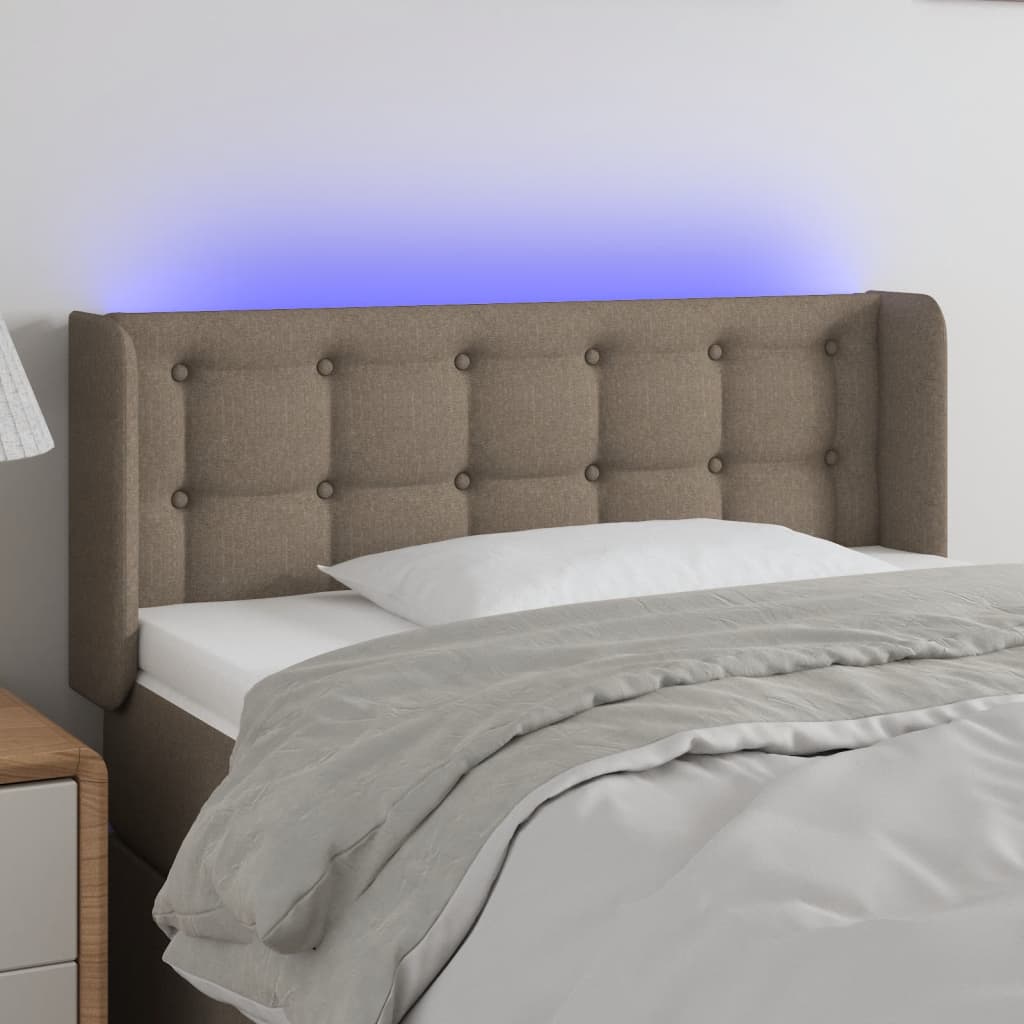 Čelo postele s LED taupe 83 x 16 x 78/88 cm textil