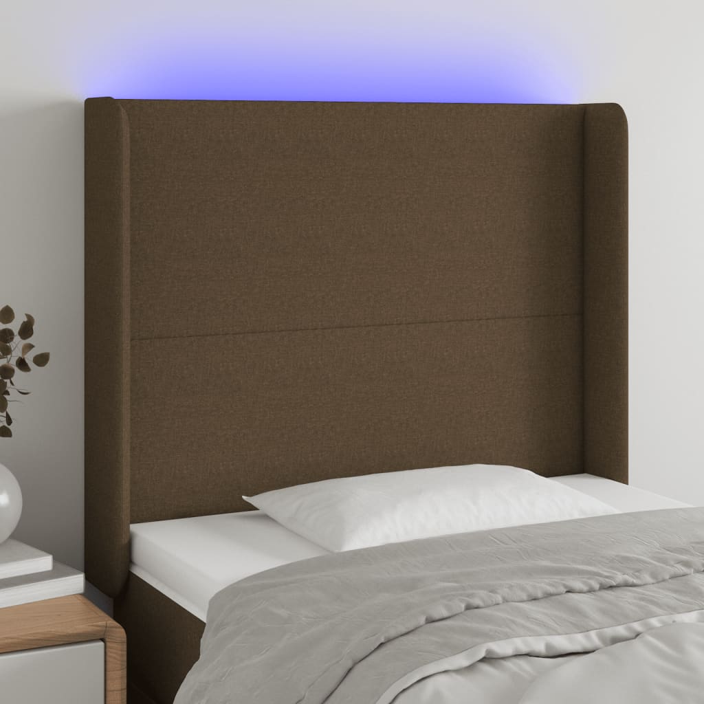 Čelo postele s LED tmavě hnědé 93 x 16 x 118/128 cm textil